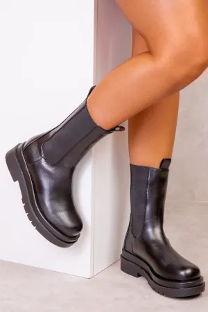STACEY STACKED BOOTS IN BLACK FAUX LEATHER